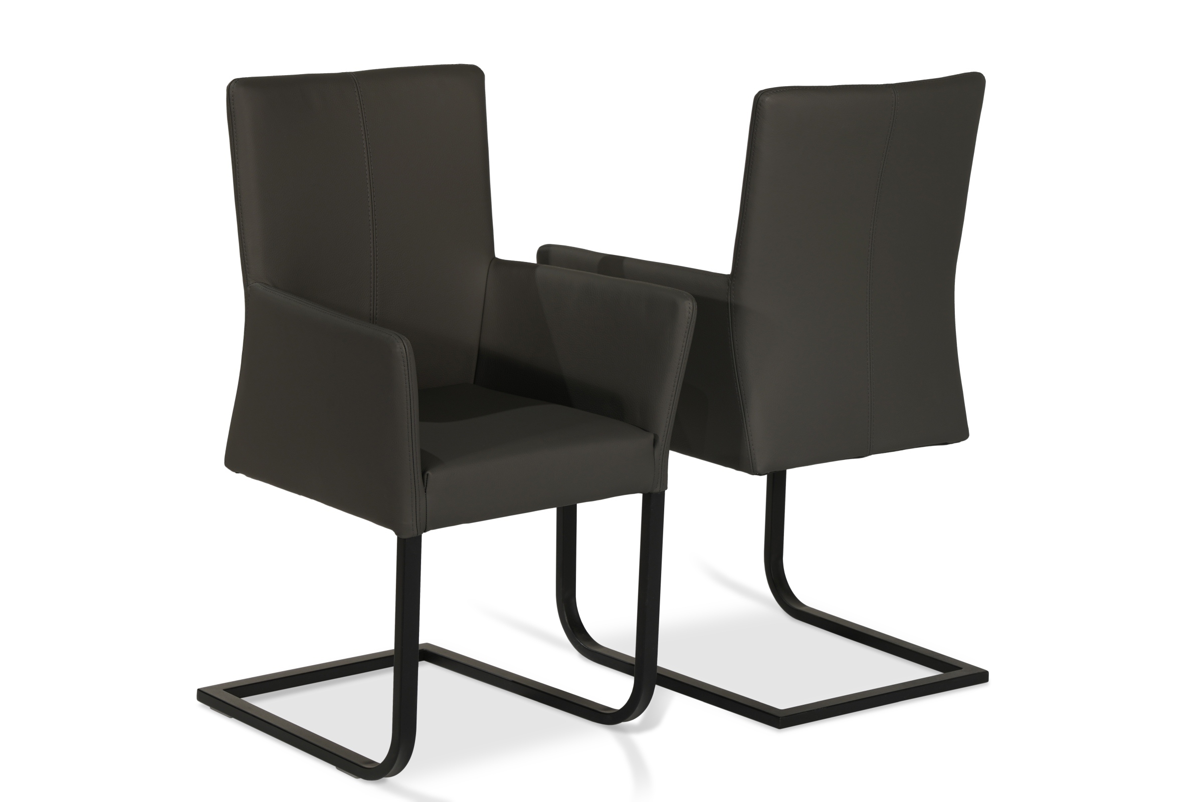 Krzesło z wysokim oparciem i podłokietnikami. Krzesło z szarej skóry do nowoczesnego wnętrza na metalowej płozie