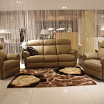 TC Meble producent Wrocław - Komplet wypoczynkowy skórzany - kolor brązowy, w skład zestawu wchodzi sofa skórzana 3-osobowa i dwa fotele skórzane z funkcją relax