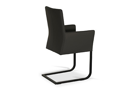 Wygodne krzesło wykonane ze skóry naturalnej w szarym kolorze. Pięknie współgra ze stołem ze spieku kwarcowego