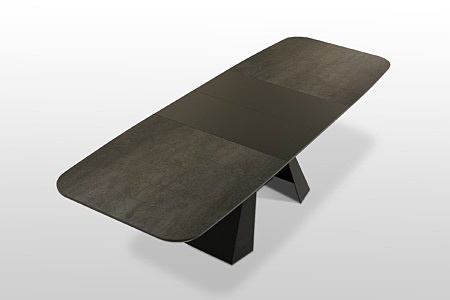 Rozkładany stół na metalowej ramie z blatem ze spieku kwarcowego z dokładkami lakierowanymi. Meble Dobrodzień