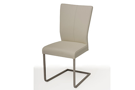 Tapicerowane krzesło z metalowymi płozami