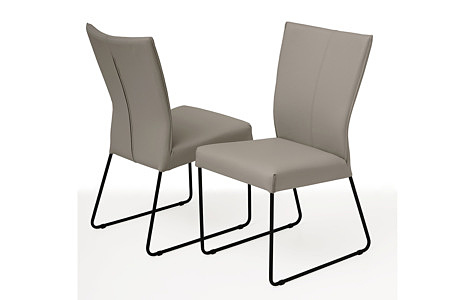Tapicerowane krzesło z metalowymi płozami