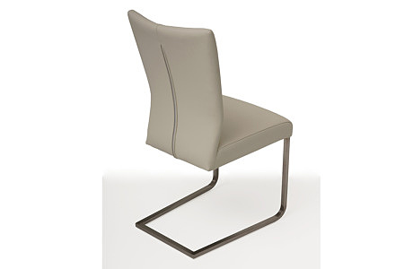 Wygodne tapicerowane krzesło z metalowymi płozami