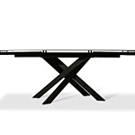 Stół na metalowych czarnych nogach ze spiekoweym blatem w kolorze betonu. TC Meble Dobrodzień.