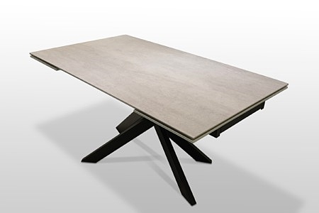 Stół z rozkładanym blatem na czarnych metalowych nogach . TC Meble Dobrodzień