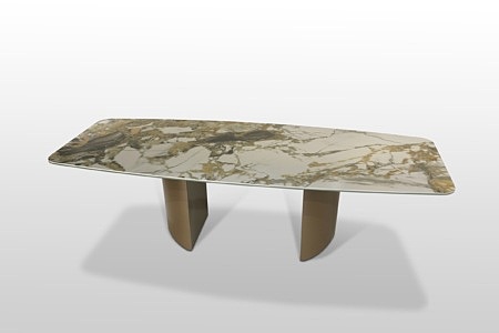 Stół nierozkładany z mocno zdobionym bletem ze spieku kwarcowego na dwóch grubych nogach.